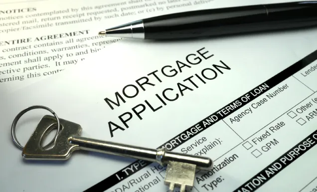 Loan officer meeting with Miami buyer to review credit and pre-approval options